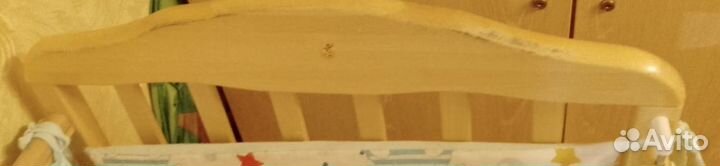 Детская кроватка с маятником