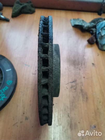 Диск тормозной передний Opel Vectra B