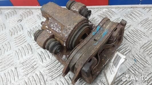 Суппорт тормозной задний правый ford explorer 4 (5