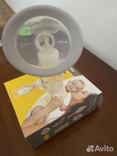 Молокоотсос medela ручной