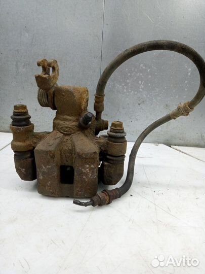 Суппорт задний правый Kia Spectra седан S6D.1.6