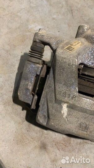 Суппорт тормозной передний левый Chevrolet Cruze