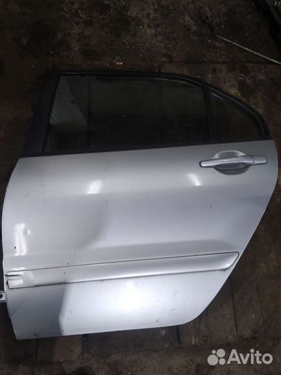 Дверь задняя левая Лансер 9