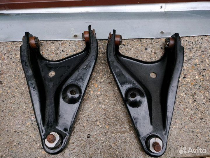 Рычаг подвески передний Renault Logan седан K7J