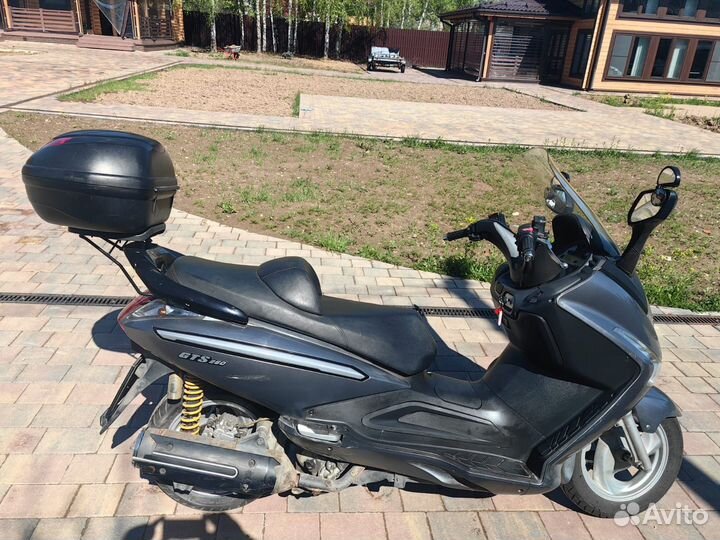 Макси скутер Sym gts250