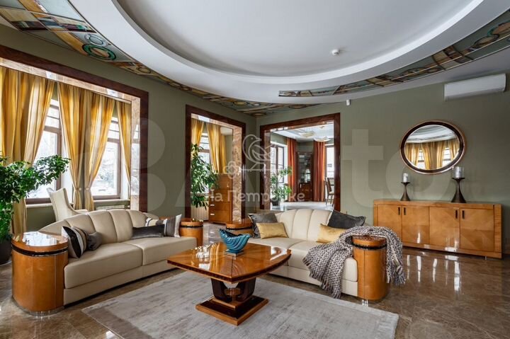 Коттедж 540 м² на участке 12 сот.