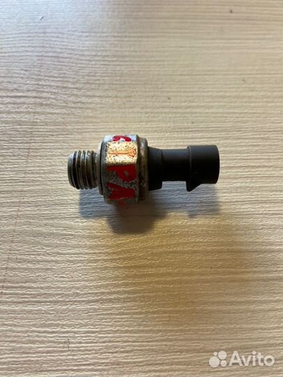 Датчик давления масла левый Opel Astra H