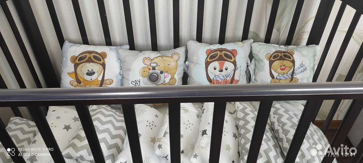 Детская кроватка с маятником и ящиком