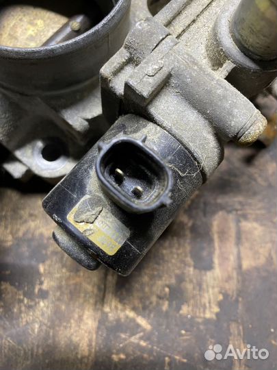 Дроссельная заслонка Mazda Familia B6