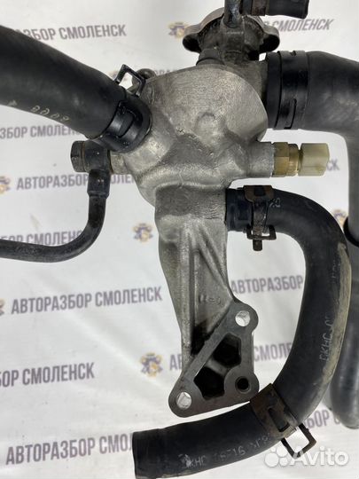 Корпус термостата Kia Carnival J3