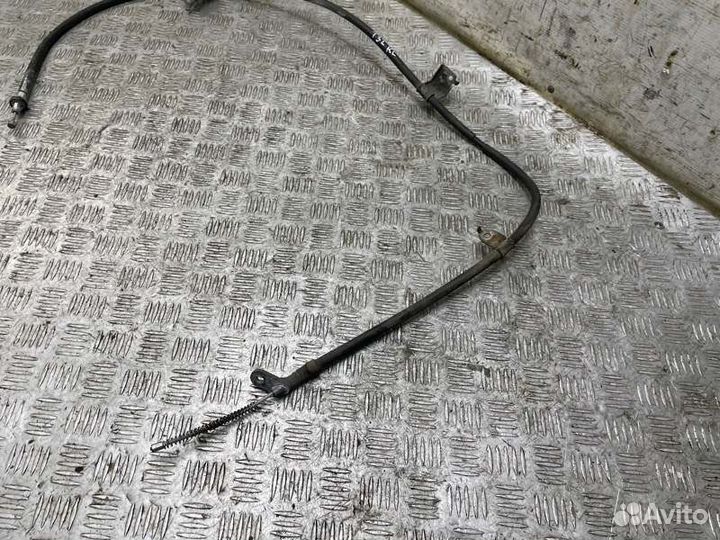 Трос ручного тормоза левый Nissan X-Trail T32