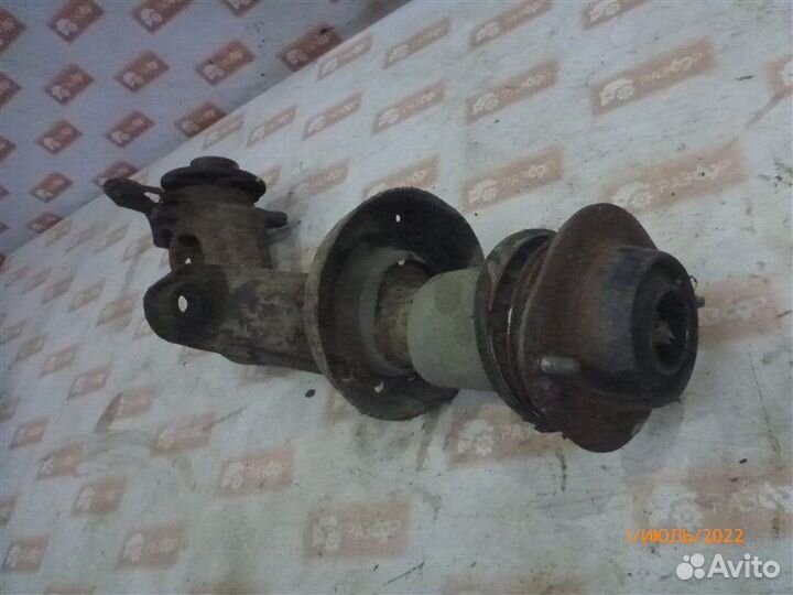 Амортизатор передний левый Daewoo Nexia N100 A15MF