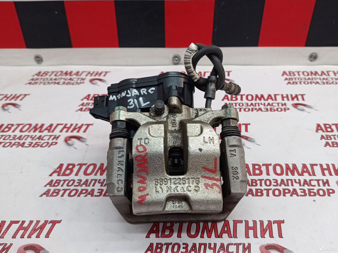 Суппорт тормозной задний левый Geely Monjaro