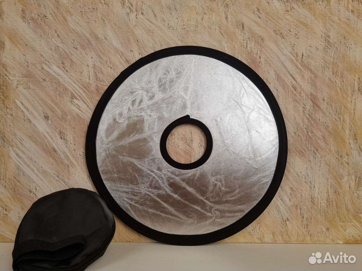 Светоотражатель на объектив