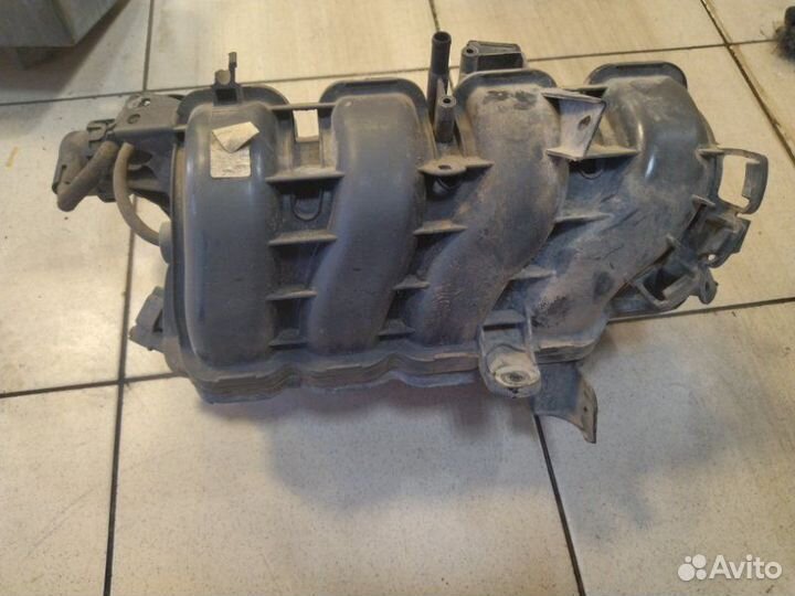 Коллектор впускной Opel Corsa D A12XER