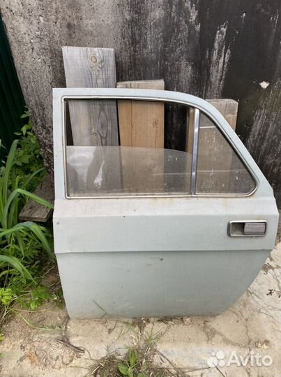 Дверь газ 2410 в сборе