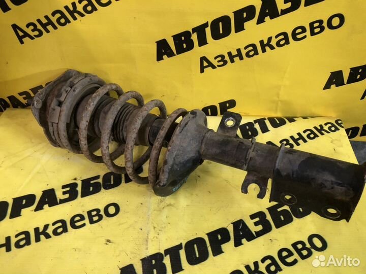 Амортизатор передний левый Kia Spectra