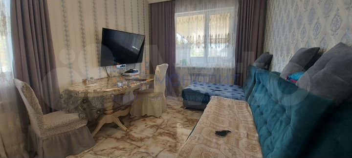 Дом 65 м² на участке 4 сот.