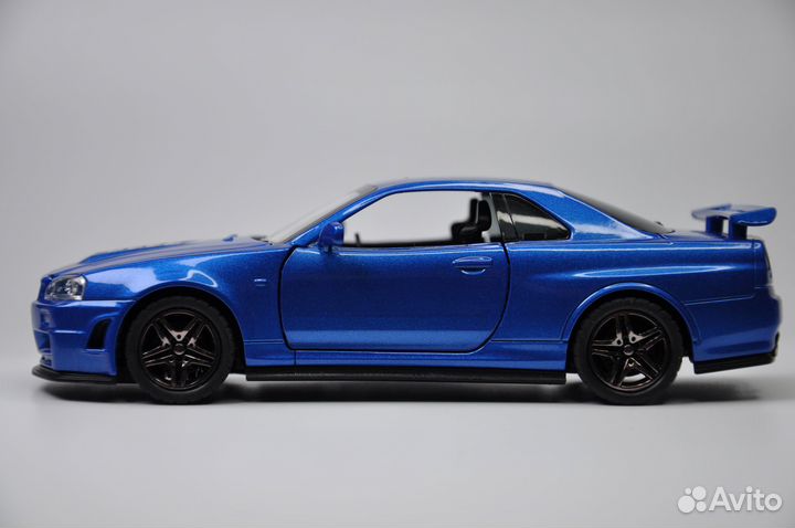 Модель авто Nissan Skyline GT-R R34 1:32 меатлл