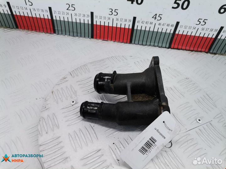 Корпус термостата Ford Fiesta 5 рест. 2010