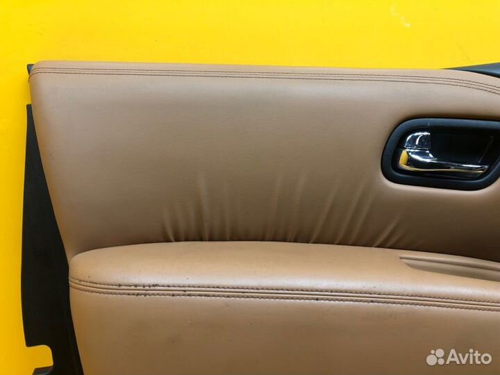Обшивка двери передняя левая Nissan Patrol Y62