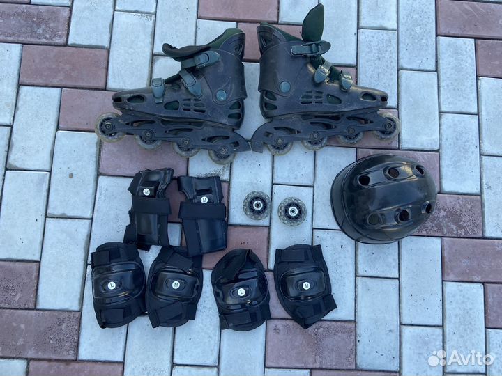 Роликовые коньки