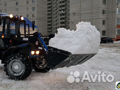 Уборка снега трактором