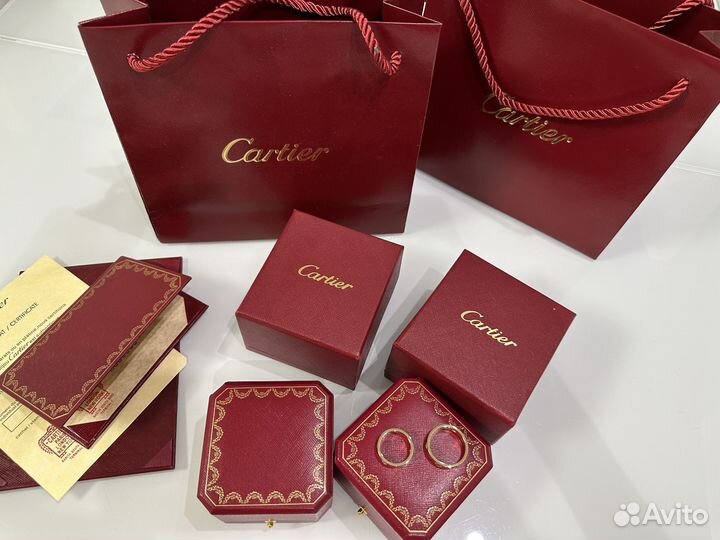 750 cartier love кольца