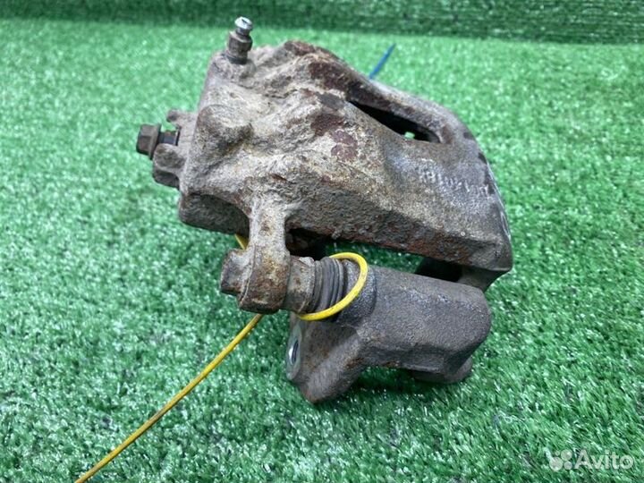Тормозной суппорт передний левый Kia Rio 3