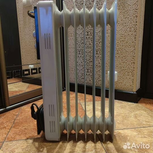 Масляный обогреватель