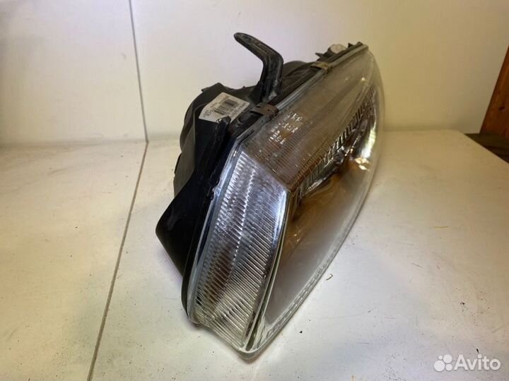 Фара галогеновая левая Nissan Almera N16 2000-2007