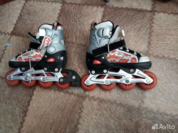 Роликовые коньки