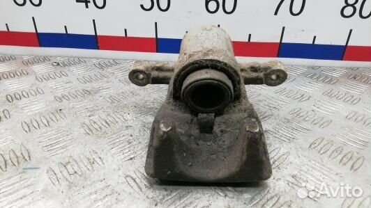 Суппорт тормозной задний правый toyota avensis T25