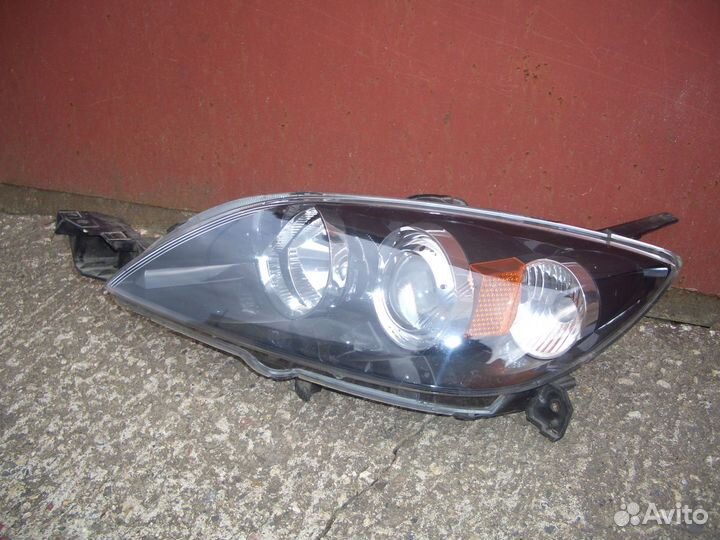 Фара левая Мазда 3 вк Х/Б с02-09г