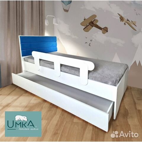 Кровать детская с защитным бортом