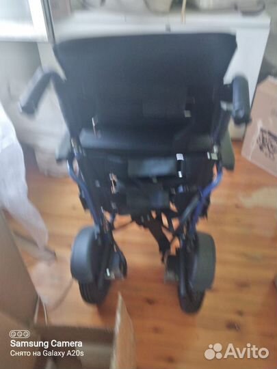 Электрическая инвалидная коляска