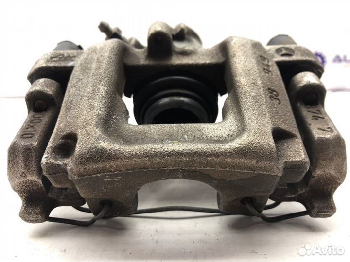 Суппорт тормозной задний левый Mercedes C-Class