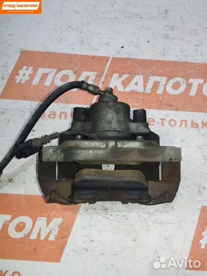 Суппорт тормозной передний левый Volkswagen Eos