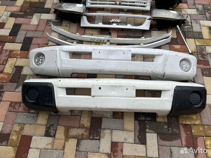 Бампер комплект pajero io pinin пинин