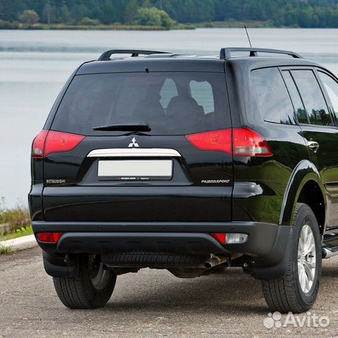 Бампер задний в цвет Mitsubishi Pajero Sport 2