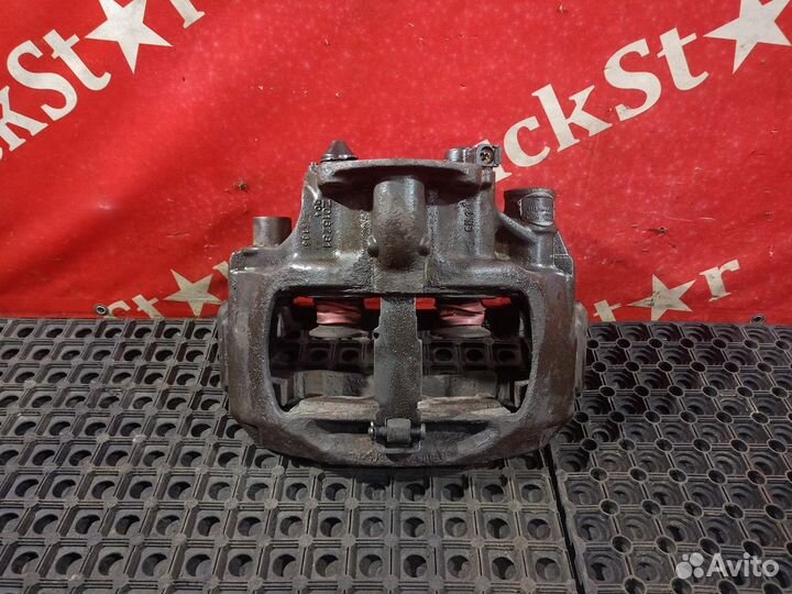 Суппорт тормозной левый