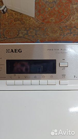 Стиральная машина с вертикальной загрузкой aeg