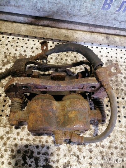 Суппорт передний левый Kia Sorento 1 2.4