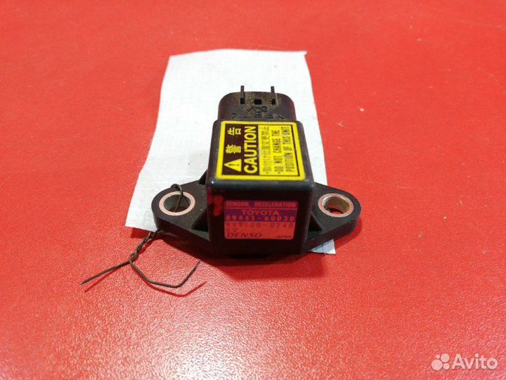 Датчик замедления Toyota Vitz NCP95 2NZ-FE