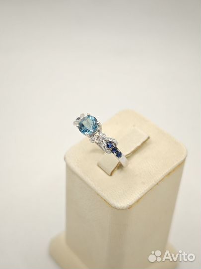 Золотое кольцо с топазом и бриллиантами