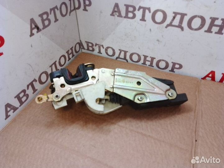 Замок двери передний левый Opel Vectra A