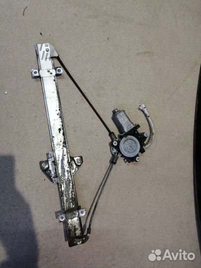Стеклоподъемник передний левый Suzuki Liana