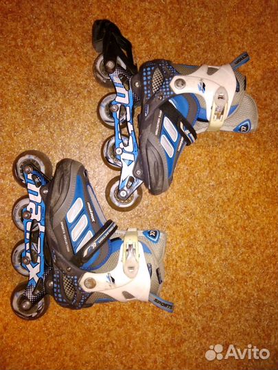 Роликовые коньки