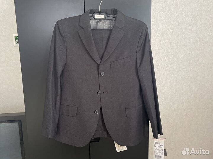 Новый школьный костюм 140