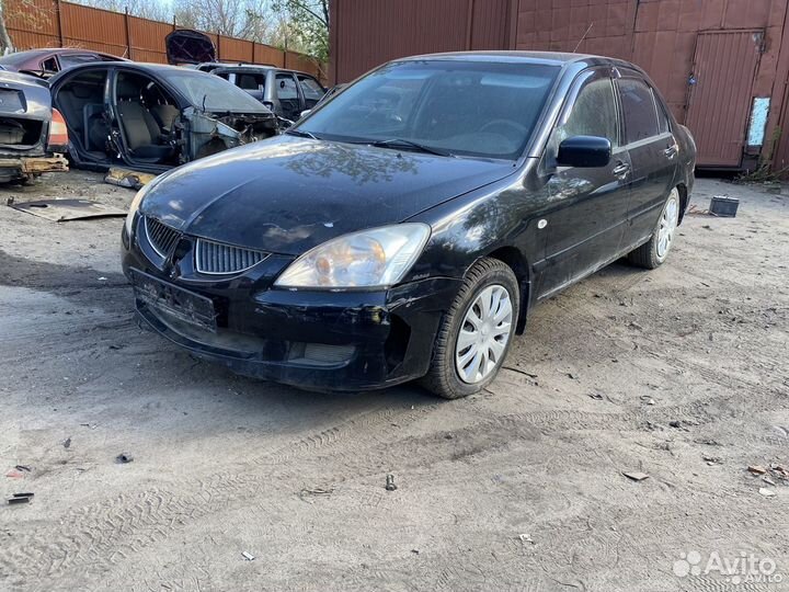 Стеклоподемник задний левый Mitsubishi Lancer 9